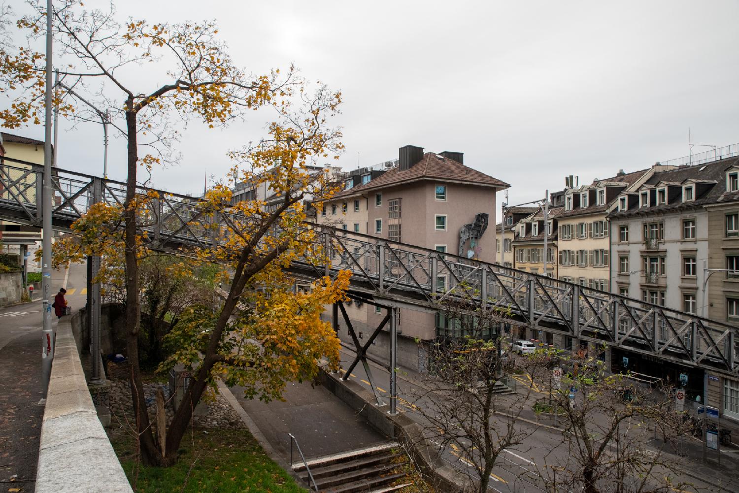 A funicular track with three roads at three different levels below it